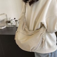 カジュアルな団子バッグのデザインと質感、女性のための多用途な大容量クロスボディバッグ 2024 新しいクラスの通勤キャンバスバッグ