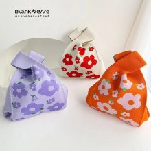 コントラストカラーのジャカードバッグ女性のための 2024 新しいハンドバッグガールニッチニットバッグホットスタイルファッションとレジャー