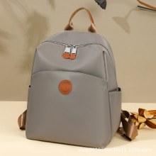 2024 ファッション新ニッチデザイン女性の小さなスクールバッグ小さなバックパックシンプルなプレミアムバックパック女性の夏の韓国スタイル