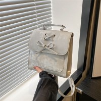 弓レディースバックパック 2024 新しいファッション韓国のバックパックトレンドかわいいポータブルショルダーバッグスクールバッグ