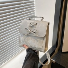 弓レディースバックパック 2024 新しいファッション韓国のバックパックトレンドかわいいポータブルショルダーバッグスクールバッグ