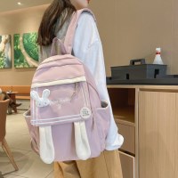 日本のアニメ周辺機器、キュートでキュートな漫画、面白い個性、ウサギの耳、柔らかい女の子の女の子のランドセル、多用途のカジュアルなレディースバッグ