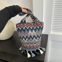 パーソナライズされたファッションシンプルなタッセルエスニックスタイルの女性用ショルダーバッグ秋と冬の新しいカジュアルバッグ女性用バケットバッグ