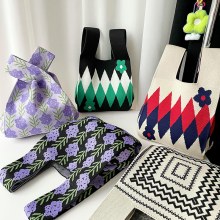 ニッチなデザイン、ハイエンドのファッション、多用途のニットショルダーバッグ、大容量の脇の下バッグ、手持ちトートバッグ、織バッグ