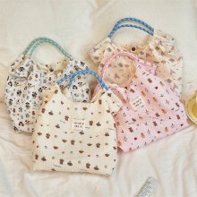 韓国エンボス加工漫画子犬ハンドバッグ女性のポータブルショルダーキャンバスバッグ通勤通勤バッグ