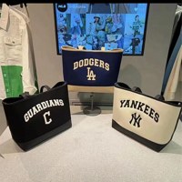 韓国人男性と女性のカップルカジュアルポータ​​ブルトートバッグキャンバス刺繍文字大容量ショッピングバッグ