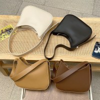 レトロサドルバッグ女性の 2023 新フレンチファッションシングルショルダー脇の下バッグ無地多用途クロスボディバッグ