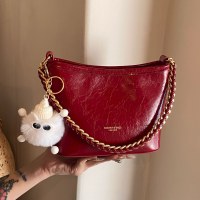 女性用ハンドヘルドチェーンバッグ 2024 新しい韓国の多用途クロスボディバッグニッチデザイン通勤ショルダーバッグ