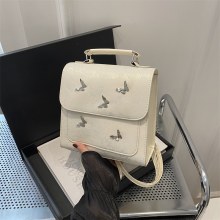 カジュアル、西洋、多用途の女性のバックパック 2024 夏の新しいスタイルの旅行ハイエンドバタフライミニスクールバッグ