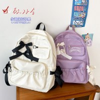 日本のアニメ周辺機器、カレッジスタイル、かわいいコントラストカラー、リボンプリーツ、個性、柔らかい女子学生ランドセル、バックパック、女性