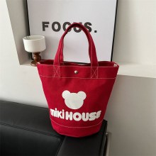 漫画の文字がプリントされた日本の新しいキャンバスバッグポータブルバケットバッグ大容量ランチボックスバッグサラリーマンバックパック