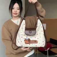 秋と冬のチョコレート子犬水玉クラウドバッグ女性の新しいカレッジスタイルのバックパックカジュアルショルダートートバッグ