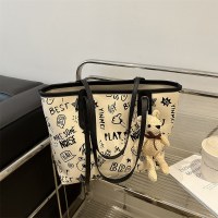 女性のための大容量トートバッグ 2024 夏の新しいスタイルの小さな新鮮なプリントショルダー通勤コンピュータバッグ