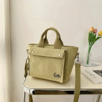 新しいレトロな香港スタイルのシンプルなクロスボディバッグ、ナショナルスタイルのトレンド、エレガントで新鮮なバックパック、ファッショナブルな通勤用無地ショルダーバッグ