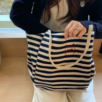 ストライプキャンバスバッグハッピーパピー刺繍ショルダー大容量ニッチショッピングバッグ怠惰なトートカジュアルバッグ女性用