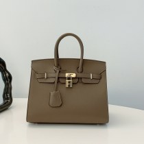 トートバッグ、ハイエンドのニッチデザインハンドバッグ、 女性 のファッショナブルで多用途な通勤ショルダーバッグ