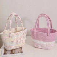 ピンクツイスト手持ち綿織バッグ新しい小さな新鮮な手持ちレディースバッグ休暇バッグビーチバッグ収納袋
