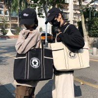 パーソナライズされたプリントファッショントレンド無地男性と女性のショルダーバッグ 2024 新しい大容量多目的ハンドバッグ