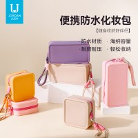 新しいドーパミン対照的な色のシリコーンポータブル化粧品バッグ女子学生ポータブル大容量携帯電話バッグ収納袋