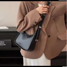 2024年の新しい女性用バゲットショルダーバッグ、シンプルで先進的なデザイン、若々しく多用途なファッショントレンド