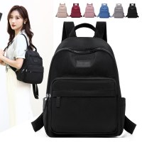 夏の新しいカジュアルデイリートラベルバックパック女性のハイエンドファッションデザイン防水大容量女性のバックパック