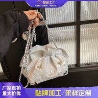 バッグ 多用途バケットバッグ 2024年夏 新しいニッチデザイン チェーンクロスボディプリーツバッグ 女性用