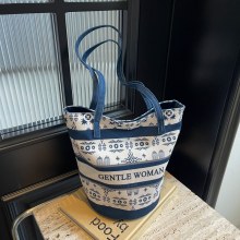 中国風の新しい中国風のバケットバッグ夏の新しいファッションキャンバスレディースバッグカジュアル多用途ポータブルGWレターバッグトレンド