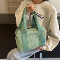 2024 新しいショルダーバッグ女性のバッグトレンディな多用途シンプルなファッション韓国語バージョン大容量ポータブルクロスボディキャンバスバッグ