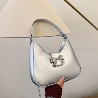 甘いソリッドカラーの弓ハンドバッグの女性 2024 新しいトレンディなファッションニッチ脇の下バッグチェーンクロスボディバッグ