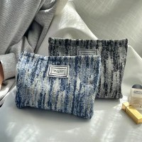 女性用の新しいフレンチジャカード化粧品バッグ、コイン携帯電話クラッチ、多用途のスキンケア製品収納バッグ、シンプルで見栄えの良い
