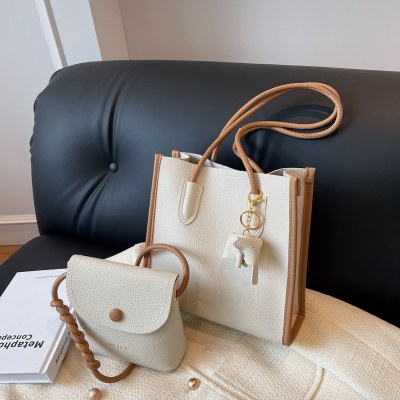 大容量 バッグ レディース 2023年新作 シンプルで万能なショルダーバッグ 今年人気の質感バケツ通勤トートバッグ