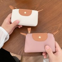 女性のための韓国風の小さな小銭入れ、新しいソフトレザーミニ収納バッグ、見栄えの良い手持ちコインバッグ、大容量の卸売