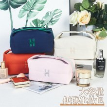 新しいシンプルなキャンバス化粧品バッグポータブル手持ち防水防塵大容量トラベルファッショントイレタリー収納袋