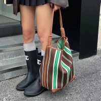 キャンバスバッグ牛革バケツバッグ大容量義母バッグ脇の下バッグ新しい多用途シングルショルダー織りストライプ大型バッグ女性用