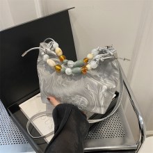 新しい中国風のバッグ 2024 夏の新しいスタイル外国スタイル多用途クロスボディバッグファッションスーパーホットビーズポータブルバケットバッグ