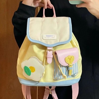 ミニバックパック 2023 新しい韓国スタイルのカラーマッチングスクールバッグ男性と女性の学生ファッションカジュアルバックパックトレンド
