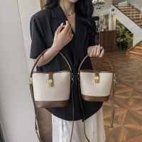 キャンバスコントラストカラーステッチポータブルバケットバッグ女性のための 2024 新しいスタイルのショルダークロスボディバッグ