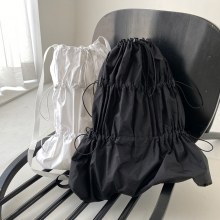 韓国の新しい夏の防水ナイロン大容量巾着バックパック軽量プリーツカジュアル男性と女性のバックパック