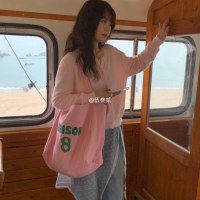 春と夏の女性用レタープリントキャンバスバッグ、ニッチデザイン、大容量ショルダーバッグ、ファッショナブルで多用途なトートバッグ