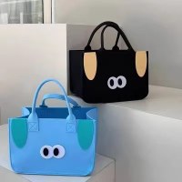 新しい大きな目の女性のハンドバッグサマースタイル女性多用途ニッチフェルトバッグかわいい大容量ランチバッグ
