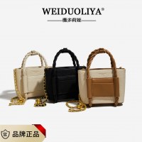 女性のコントラストカラーの編み込みポータブル大容量トートバッグ女性用ファッショナブルで多用途