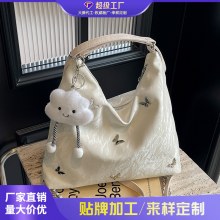 女性のための大容量バッグ 2024 新しいハイエンドニッチデザイン通勤多機能ダブルショルダーシングルショルダークロスボディバックパック