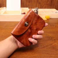 女性用の新しい初層牛革植物タンニンなめしピックアップバッグ、男性用のアンティーク調レトロな小銭入れ、女性用の大容量牛革収納バッグ