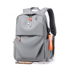 新しいシンプルなバックパックカジュアル無地バックパックビジネス通勤コンピュータバッグ中学生スクールバッグ