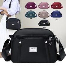 女性用カジュアルショルダーバッグ、毎日の旅行用携帯電話バッグ、ファッショナブルでパーソナライズされたデザイン、女性用のコンパクトで大容量のナイロンクロスボディバッグ