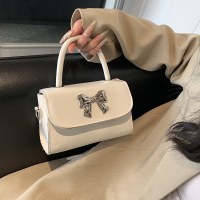 バッグレディースニッチレトロショルダーバッグ冬の新しいカジュアルトレンディな小さなスクエアバッグリボン人気のクロスボディ