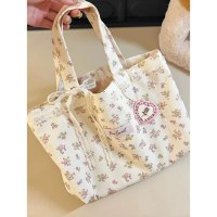 韓国の大容量花柄キャンバストートバッグ 2024 新しい森の花通勤ショルダーバッグニッチハンドバッグ