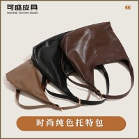 レトロな無地のトートバッグ、クラシックな大容量の通勤バッグ、PUの質感、多用途のショルダーバッグ、レディースバッグ