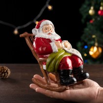 新しいリクライニングチェアサンタクロースクリスマスホームデスクトップ雰囲気装飾樹脂工芸品装飾品