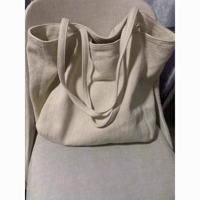女性のための大容量バッグ 2024 新しいスタイルシンプルで多用途な通勤シングルショルダーキャンバス通勤バッグ外出ポータブルハンドバッグ